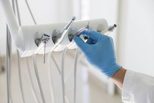 Professional Tooth Extraction technician working in Oak Ridge North, TX